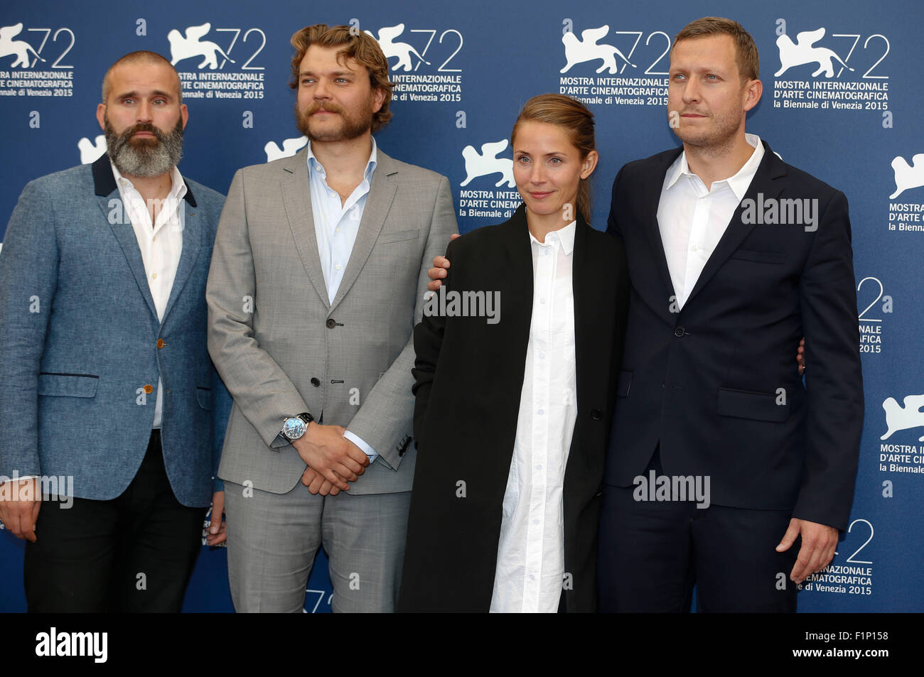 (150905) -- VENICE, Sept. 5, 2015 (Xinhua) -- Producer Rene Ezra, actors Pilou Asbaek, Tuva Novotny and director Tobias Lindholm (from L to R) attend a photocall for 'A War'  during the 72nd Venice Film Festival at Lido island in Venice, Italy, Sept. 5, 2015. (Xinhua/Ye Pingfan) Stock Photo