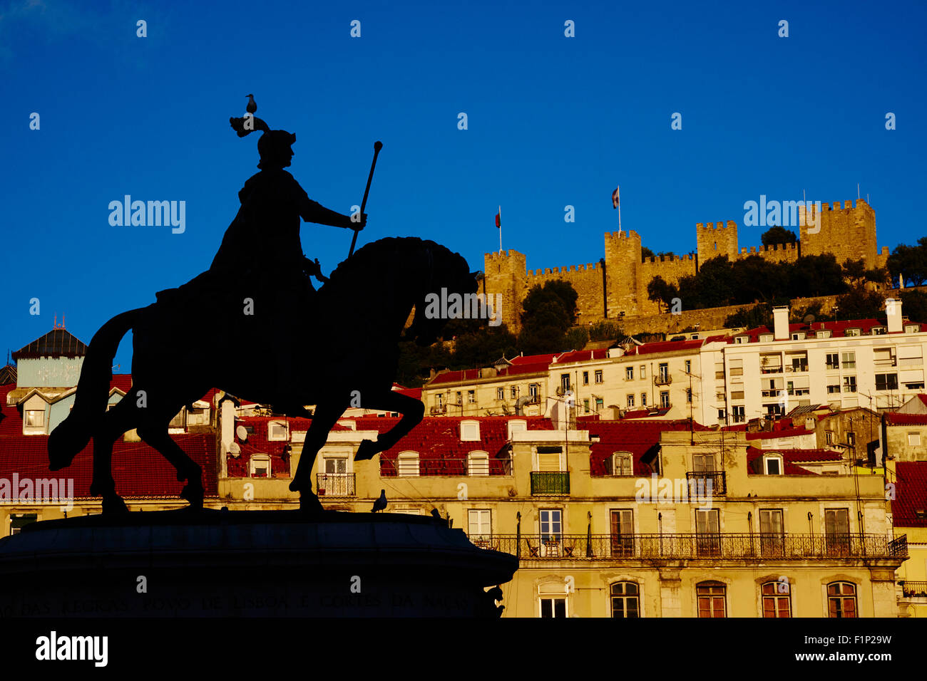 Portugal, Lisbon, Praca de Figueira, king Jao I statue and Sao Jorge castle Stock Photo