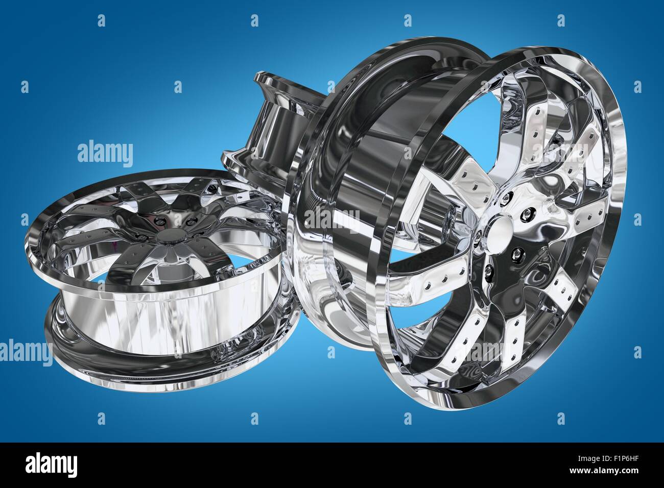 Chromed Car Alloy Wheels on Blue Background. Three Chrome Alloy Wheels