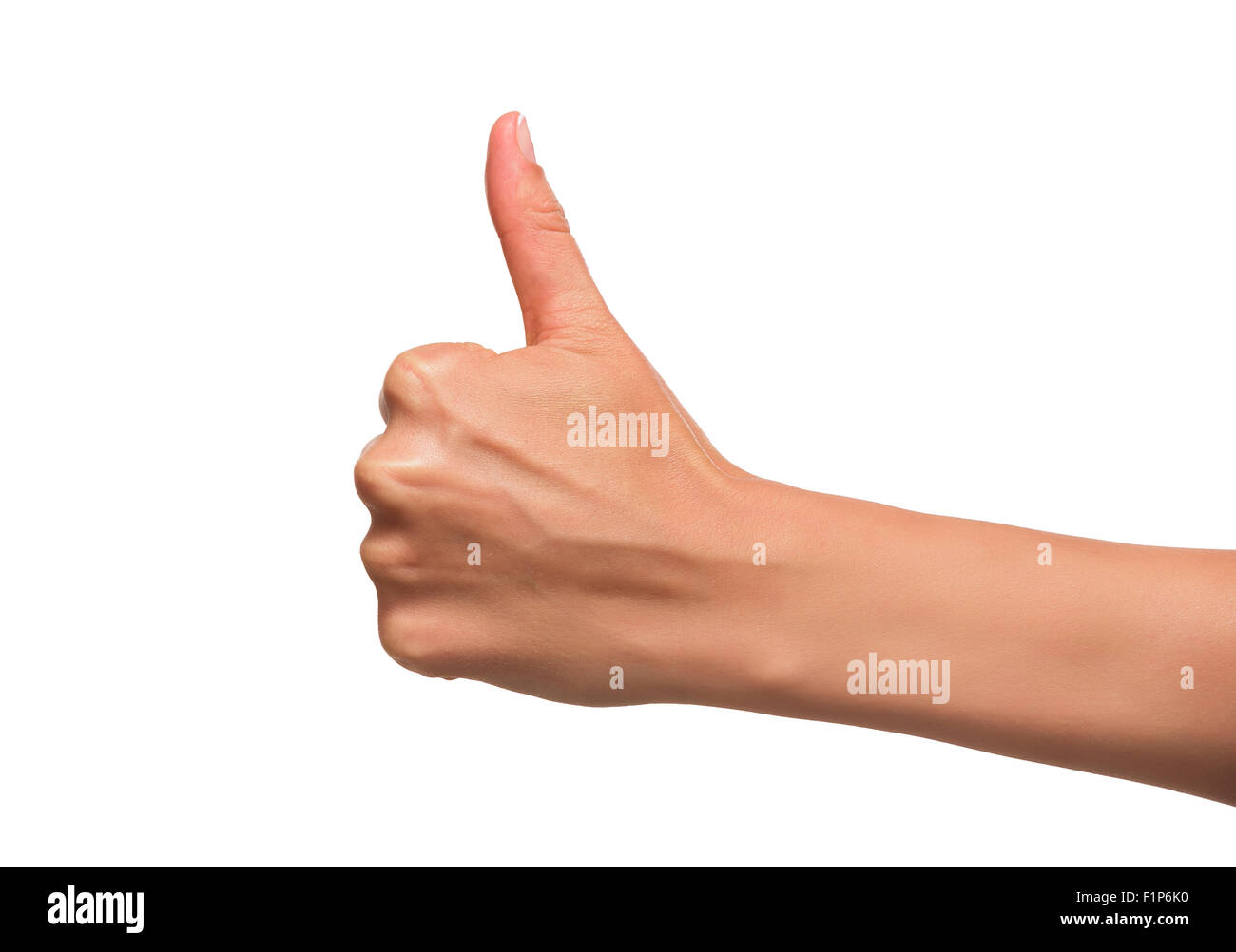 Woman hand with thumb up. Stock Photo