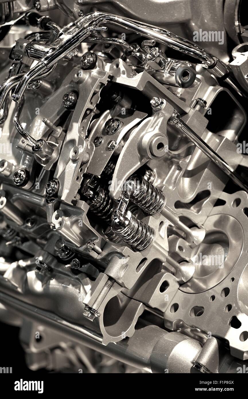 Metallic Modern Vehicle Engine Photo Background - Vertical Photo. Engine Closeup. Technology Photo Collection Stock Photo