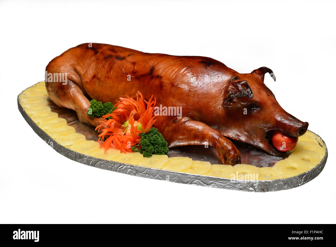 A whole roasted pig ready to serve Stock Photo