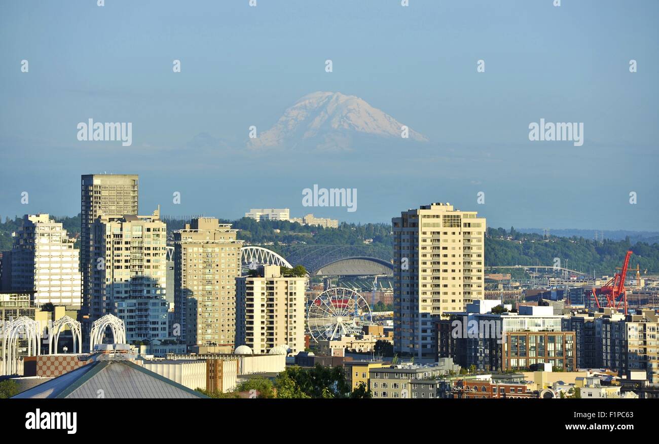 Mt Rainier and Seattle. City of Seattle - Mount Rainier Dominates the ...