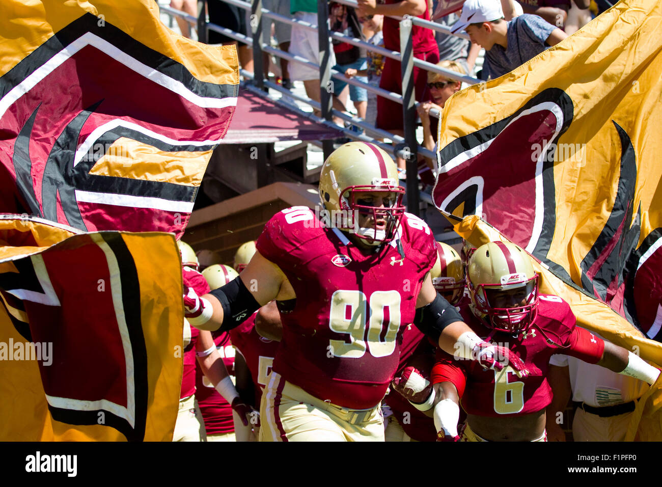 Chestnut Hill, MA, USA. 5th September, 2015. Boston College Eagles defensive lineman Connor Wujciak (90) and Boston College Eagles wide receiver Sherman Alston (6) lead the team onto the field during the NCAA football game between the Boston College Eagles and Maine Black Bears at Alumni Stadium. Boston College defeated main 24-3. Anthony Nesmith/Cal Sport Media Stock Photo