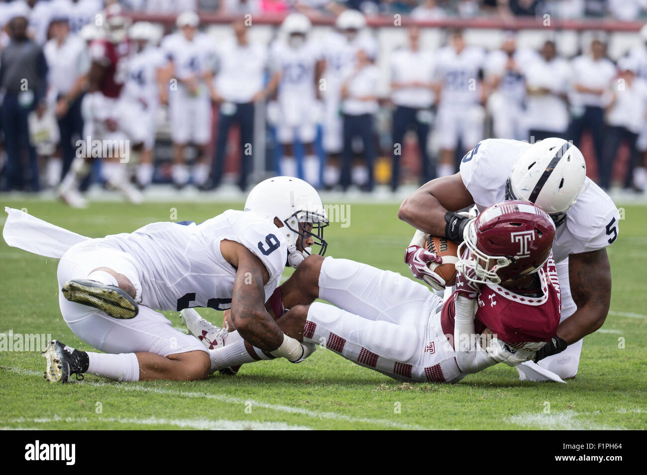 September 5, 2015: Temple Owls wide receiver Robby Anderson (19) gets taken down by Penn State Nittany Lions linebacker Nyeem Wartman-White (5) and safety Jordan Lucas (9) during the NCAA football game between the Penn State Nittany Lions and the Temple Owls at Lincoln Financial Field in Philadelphia, Pennsylvania. The Temple Owls won 27-10. Christopher Szagola/CSM Stock Photo