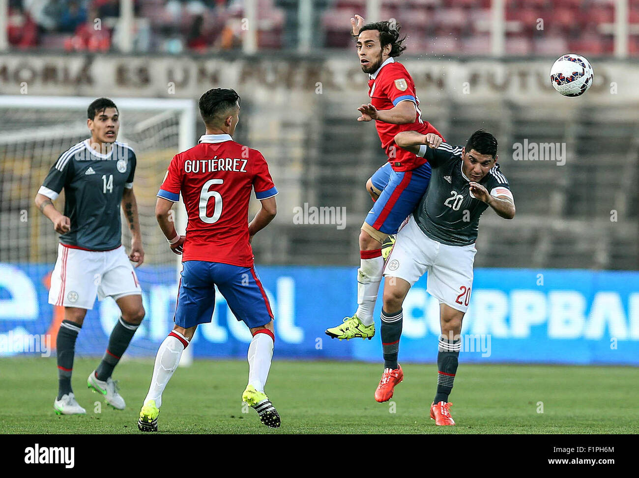 Santiago, Chile. 5th Sep, 2015. Image provided by Chile's National Professional Soccer Association (ANFP) shows Chile's Jorge Valdivia (2nd R) vying with Paraguay's Nestor Ortigoza (1st R) during a friendly match at the National Stadium in Santiago, Chile, on Sept. 5, 2015. Chile won the match. Credit:  ANFP/Xinhua/Alamy Live News Stock Photo