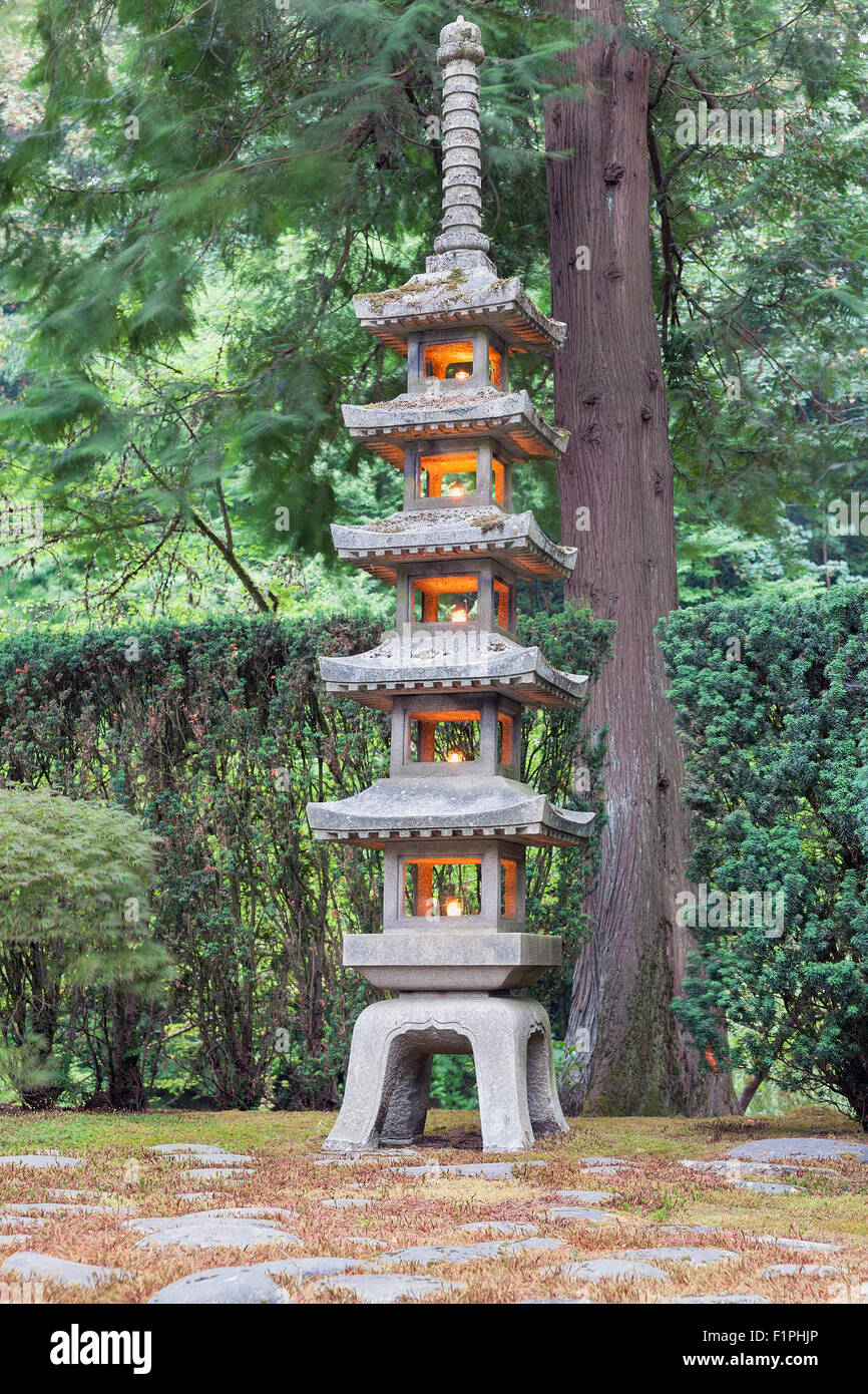 Tall Pagoda Stone Lantern at Japanese Garden Stock Photo
