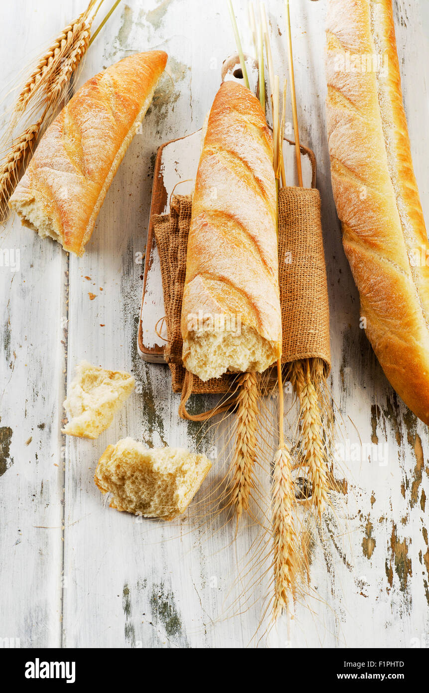 french baguette on a vintage white background. Top view Stock Photo - Alamy