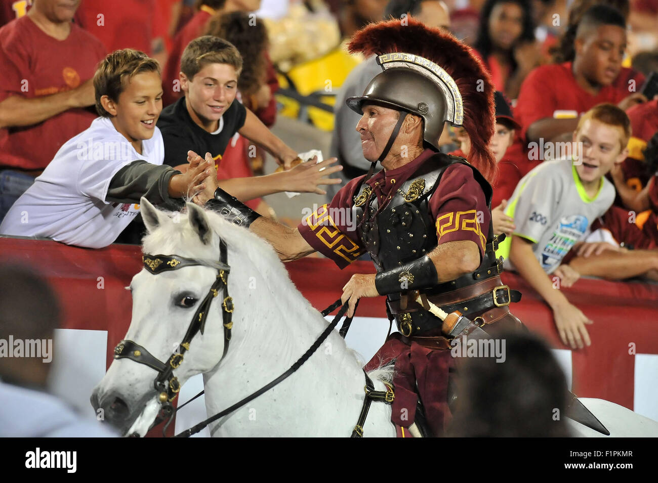 Los Angeles, CA, USA. 5th Sep, 2015. USC Trojans Mascot Tommy Trojan greets fans after a touchdown score during the NCAA Football game between the Arkansas State Red Wolves and the USC Trojans at the Coliseum in Los Angeles, California.Louis Lopez/CSM/Alamy Live News Stock Photo