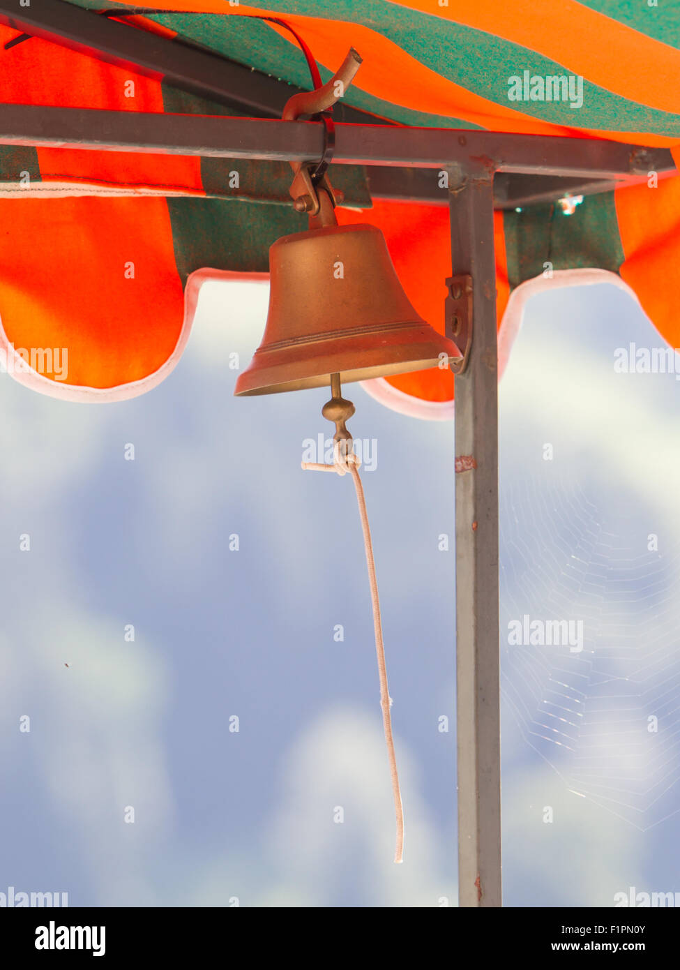 Old brass bell on a market, Switzerland Stock Photo Alamy