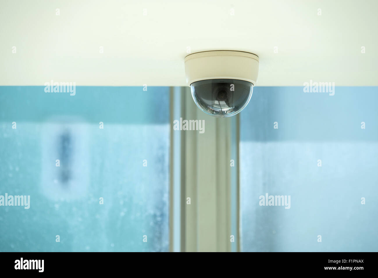 Dome security camera indoors Stock Photo Alamy