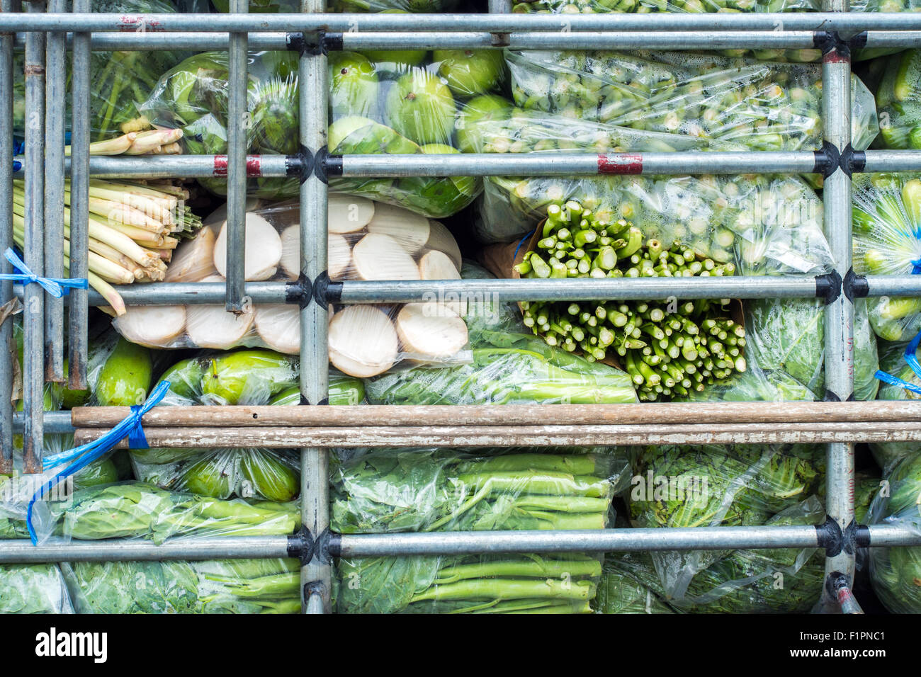fresh vegetables in cage for transports Stock Photo