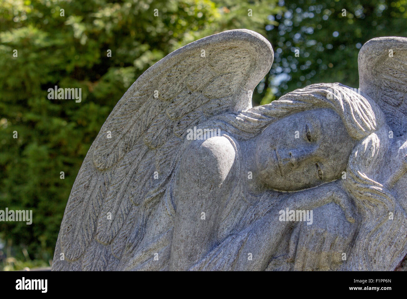 Angel figure with eyes closed Stock Photo