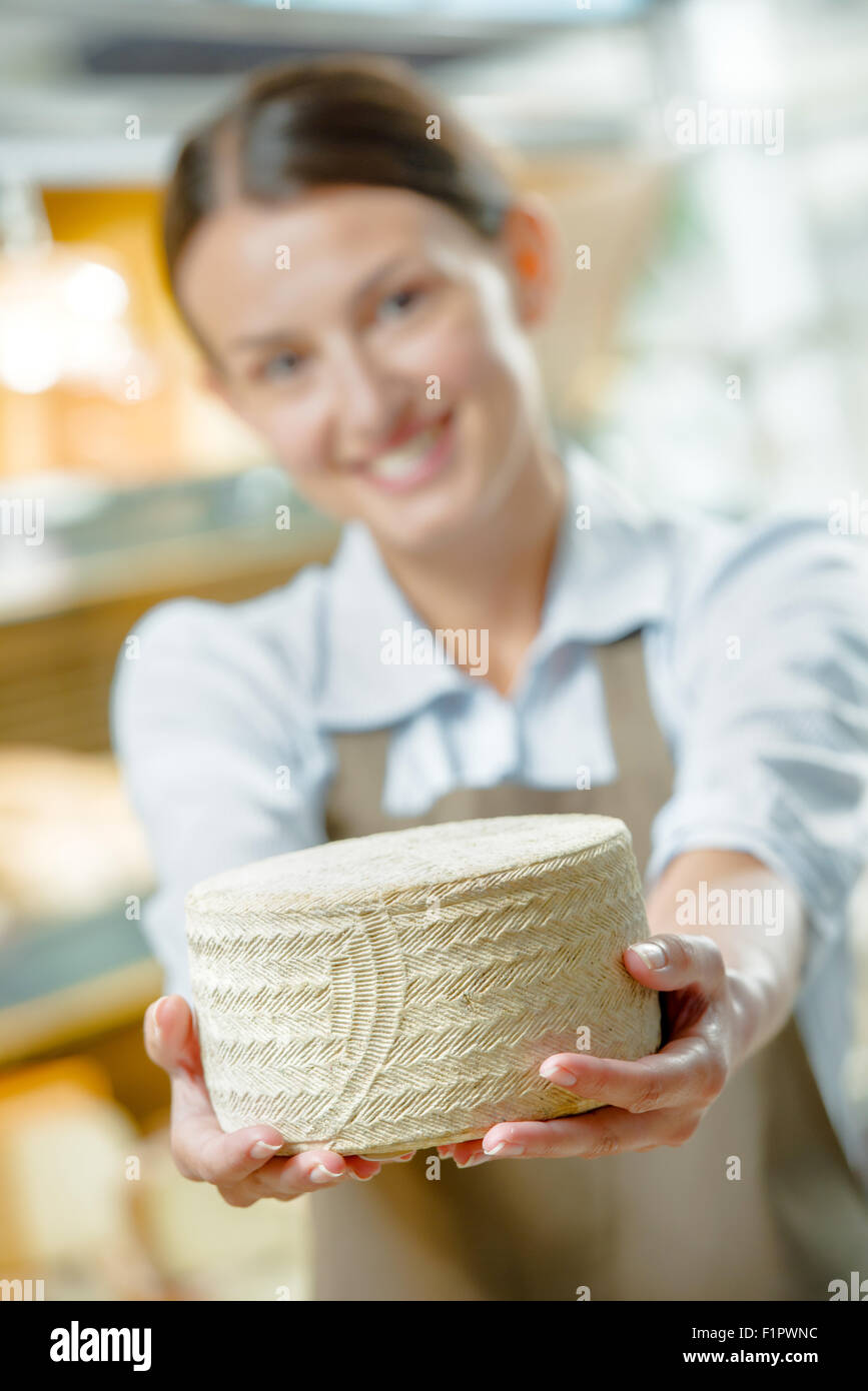 Woman selling you some cheese Stock Photo