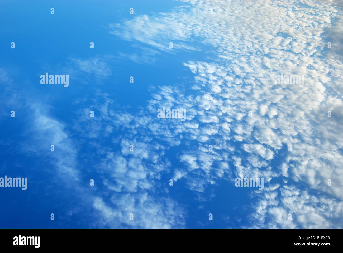 White clouds in blue sky. Blue sky background texture Stock Photo - Alamy