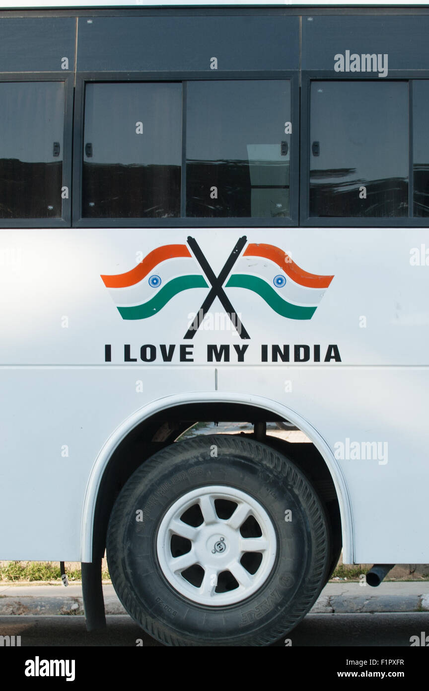 Amritsar, Punjab, India. 'I love my India' painted on a new, modern bus with two Indian flags. Stock Photo