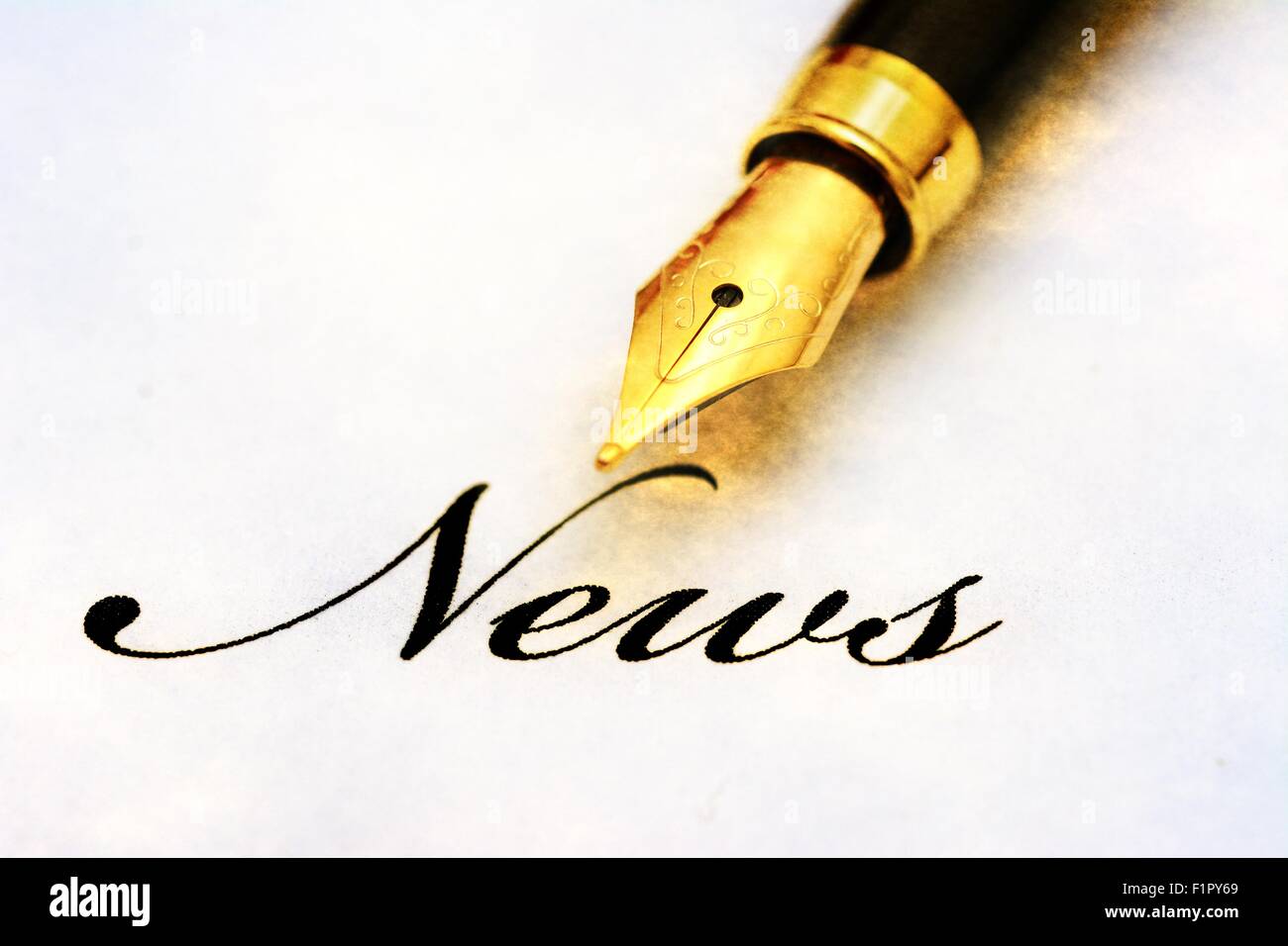 News text and fountain pen Stock Photo