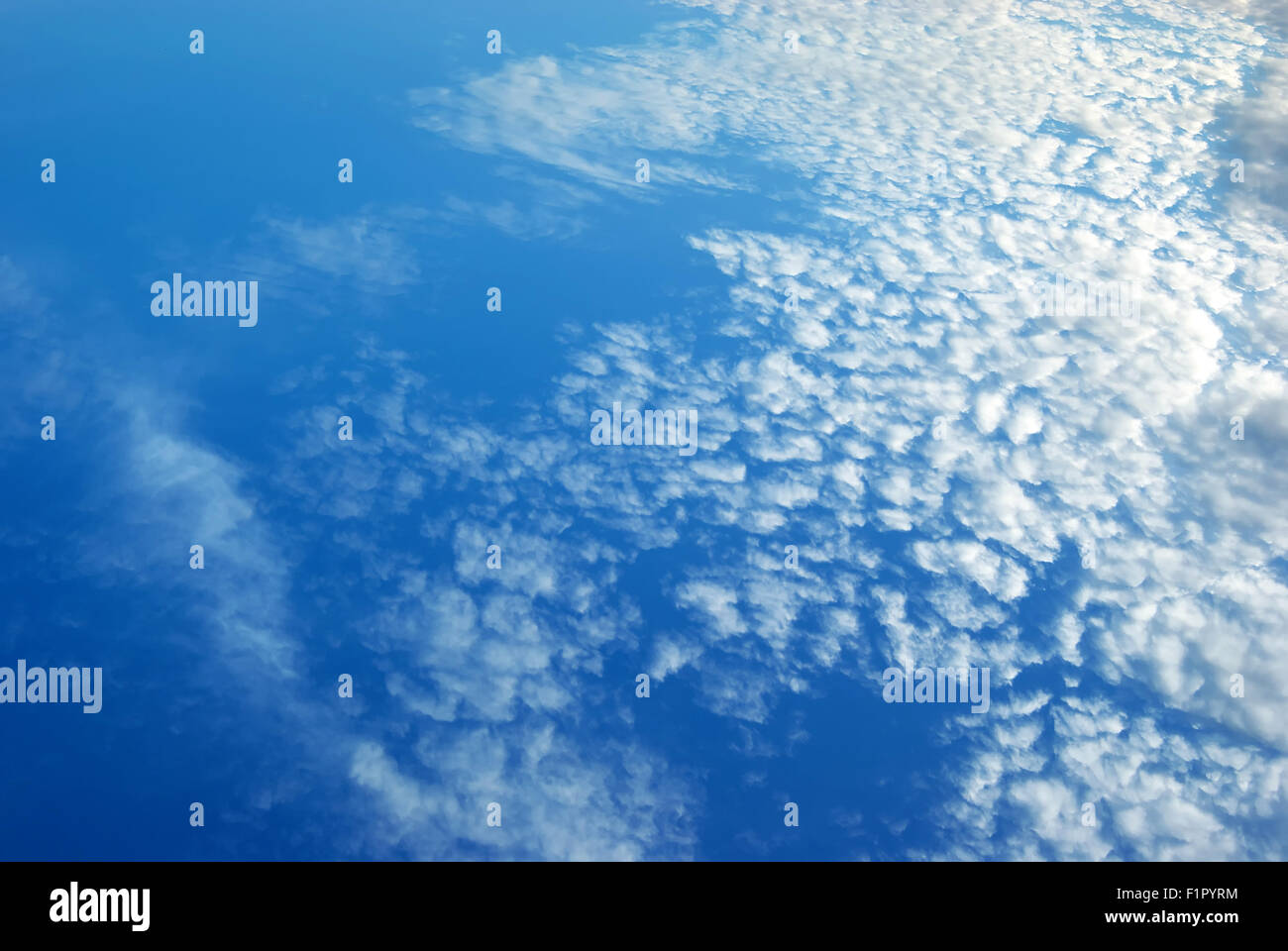 White clouds in blue sky. Blue sky background texture Stock Photo - Alamy