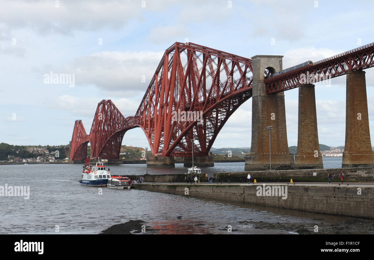 Maid of the Forth tourism boat and Forth Rail Bridge Scotland  September 2015 Stock Photo