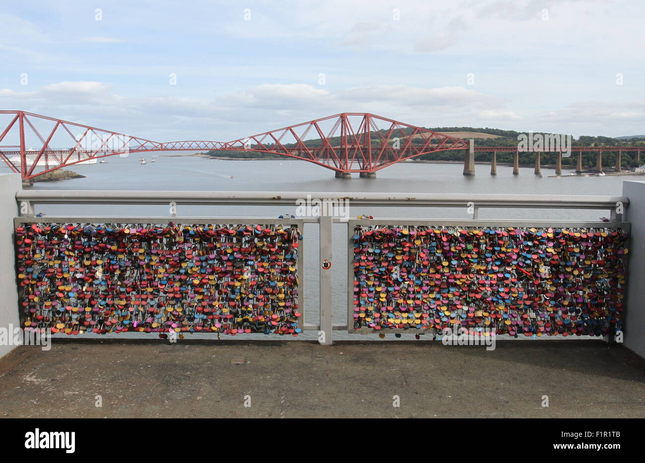 Padlocks attached to Forth Road Bridge and Forth Rail Bridge Scotland September 2015 Stock Photo