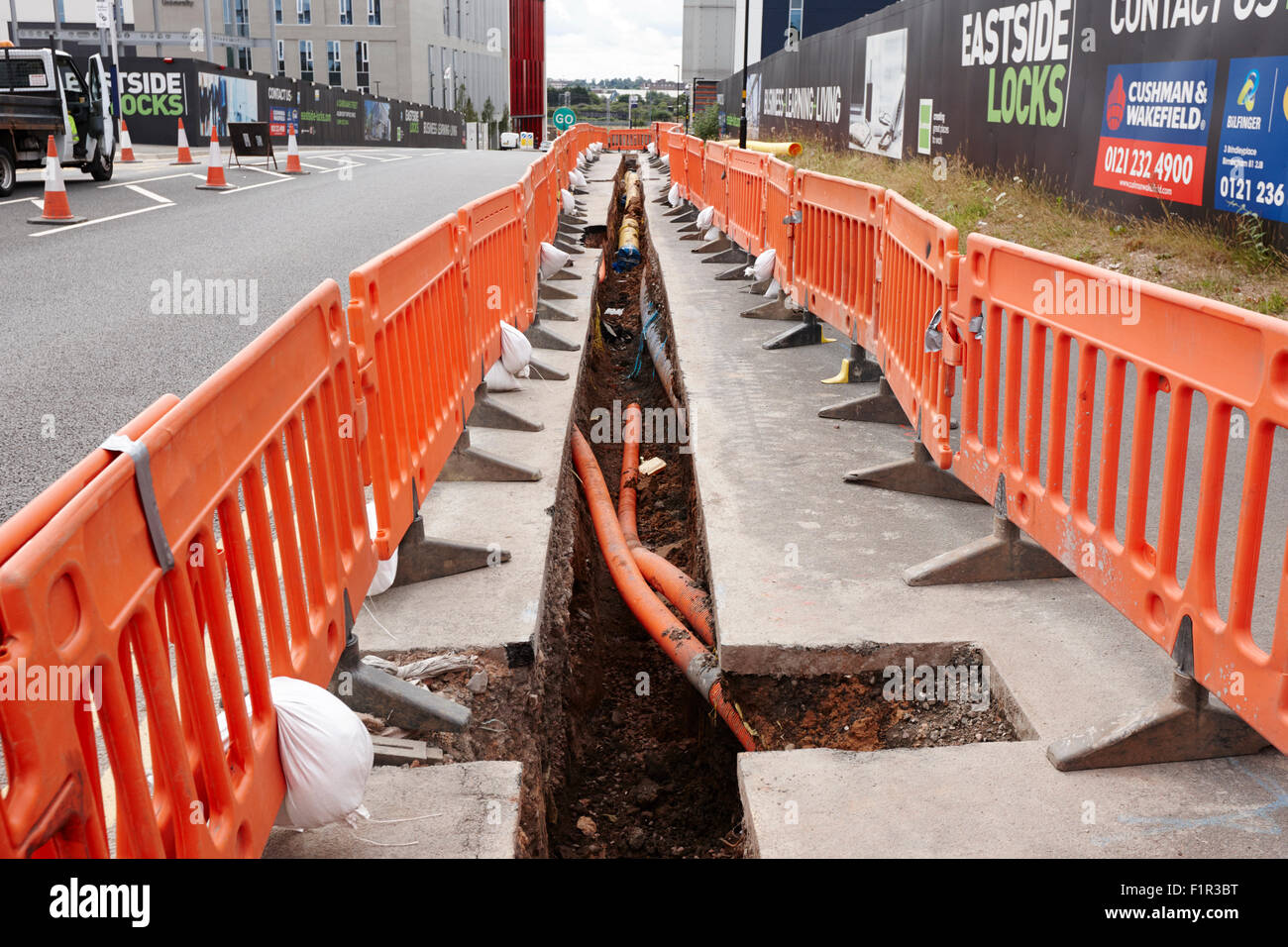 new services trench dug to lay gas and fibre optic infrastructure Birmingham UK Stock Photo