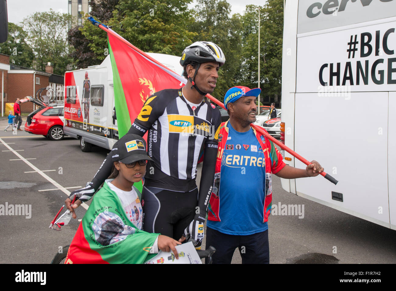London, UK. 6th September, 2015. Eritrean cyclist Daniel Teklahaimanot is pictured with fans following stage one of the Aviva Tour of Britain between Beaumaris and Wrexham, United Kingdom on 6 September 2015. The race starts on 6 September in Beaumaris, Anglesey, and ends on 13 August in London, United Kingdom. Credit:  Andrew Peat/Alamy Live News Stock Photo