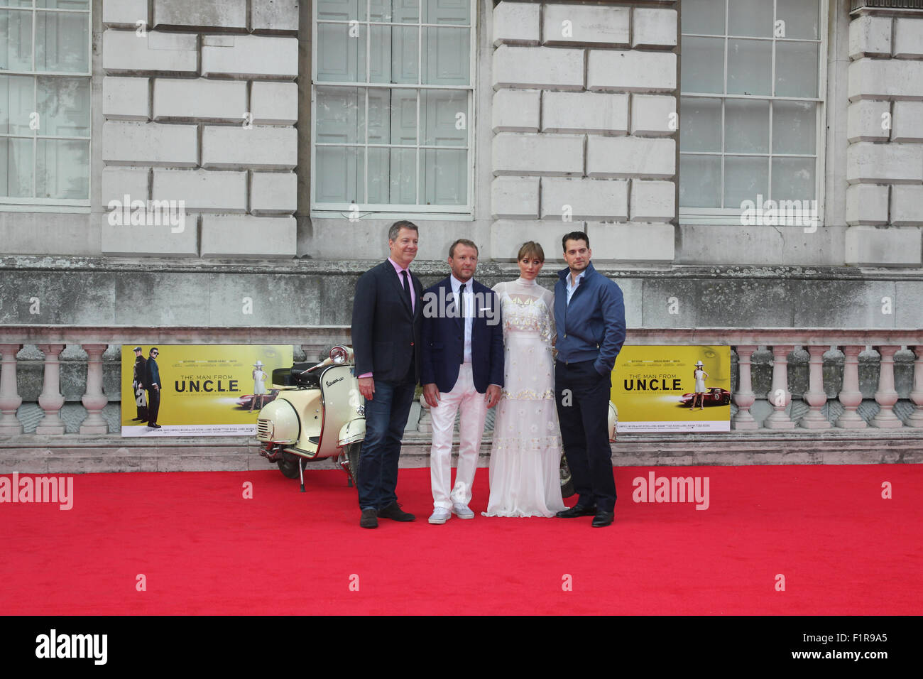 London, UK, 7th Aug 2015: (L-R) Lionel Wigram, Guy Ritchie, Jacqui Ainsley and Henry Cavill attend The Man from U.N.C.L.E. - UK Stock Photo