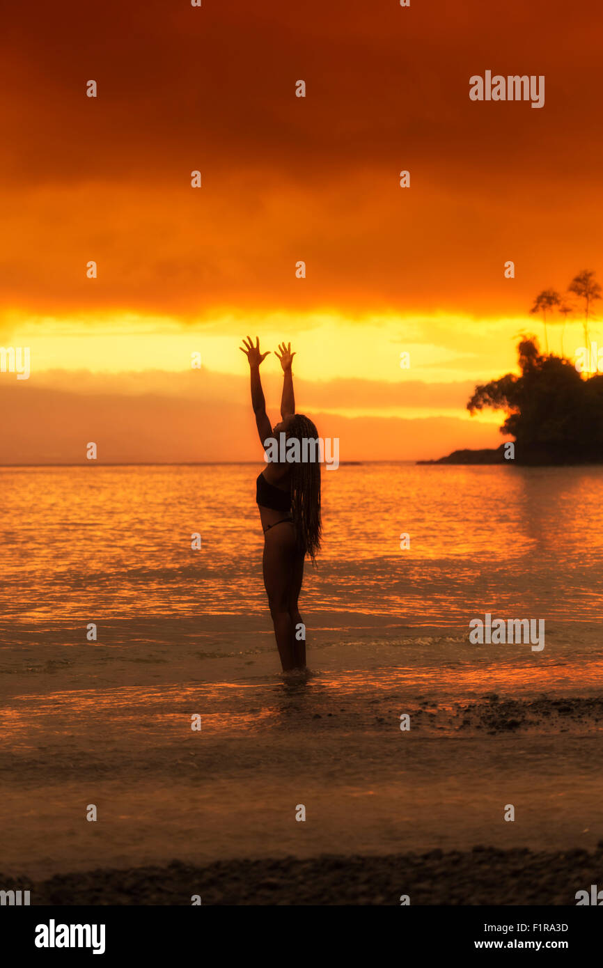 Yoga by the ocean Stock Photo