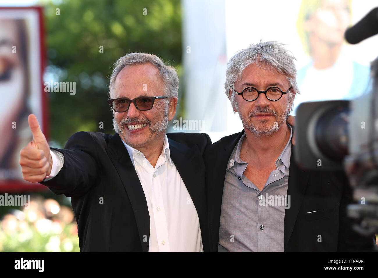 Actor Fabrice Luchini (L) and director Christian Vincent attend the red carpet event for the movie "L'Hermine" at the 72nd Venice Film Festival in Venice, ...
