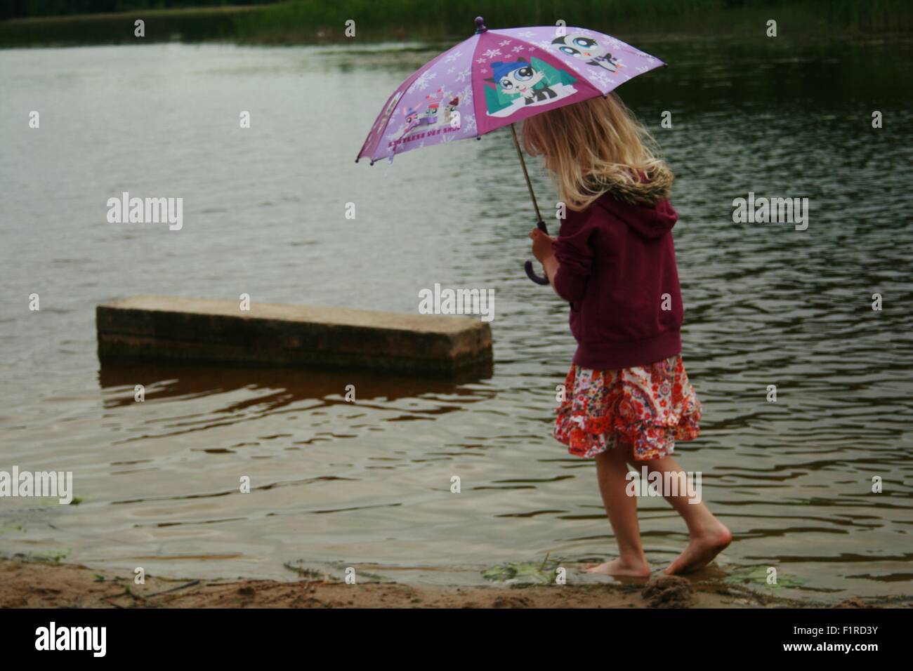 Girl with an umbrella Stock Photo