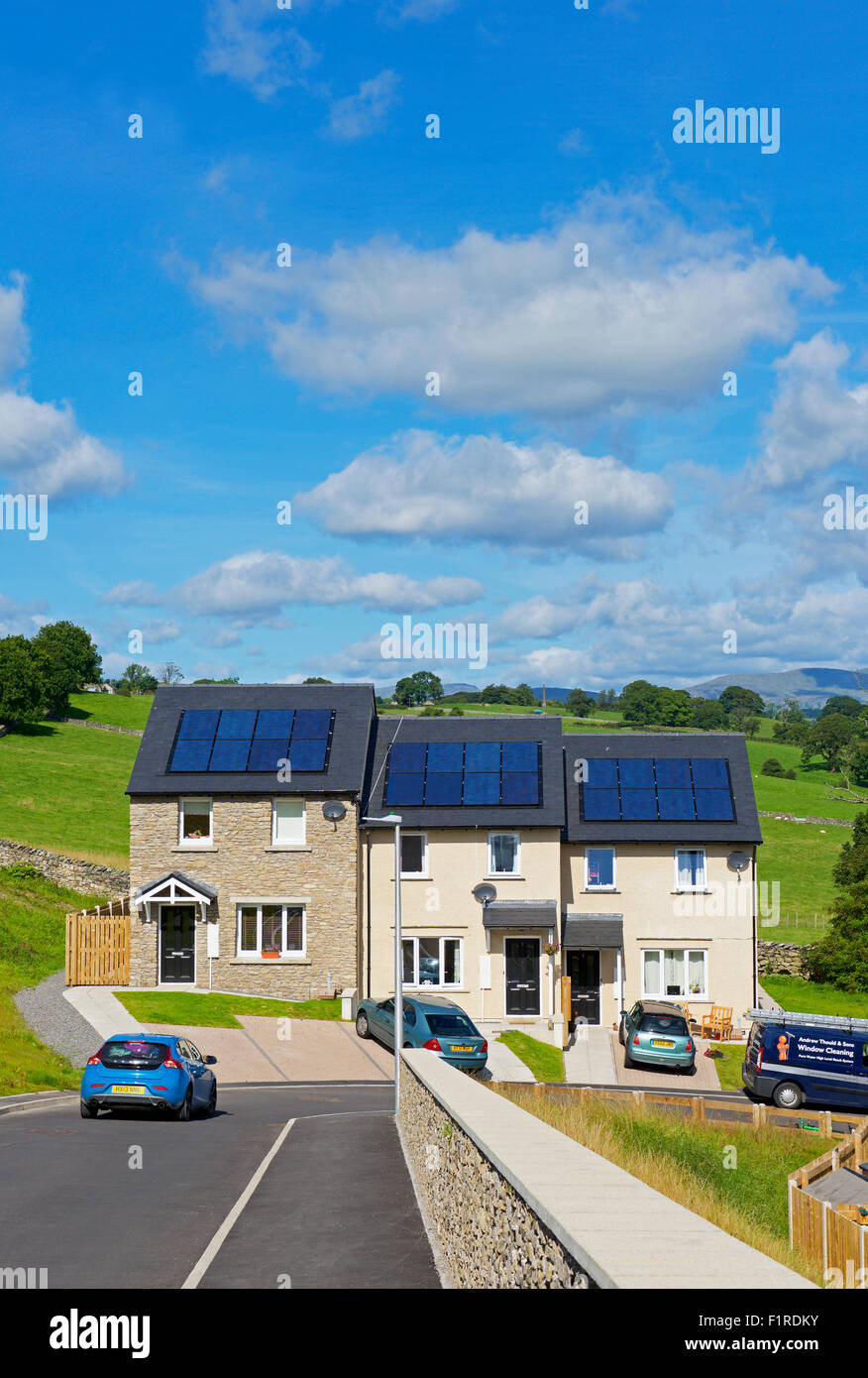 New housing - Fir Tree Rise - with all houses having solar panels, Kendal, Cumbria, England UK Stock Photo