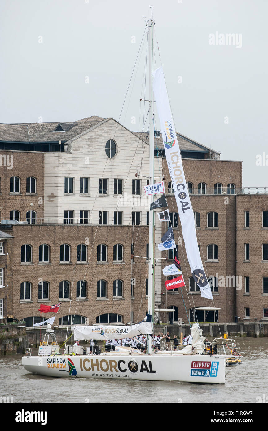 London, UK. 30 August 2015.  File picture from the start of the Clipper Round the World Yacht race.  Ichorcoal, pictured, one of the twelve yachts competing in the Clipper Round the World race, leaves its moorings in St. Katherine's Dock for the journey down the River Thames for the start of their 40,000 mile.  This picture goes with the breaking news story where Andrew Ashman from south-east London and one of the amateur crew onboard the Ichorcoal has died taking part in the Clipper Round The World Yacht Race.  He was adjusting the sail of his team's boat when he was knocked unconscious. Stock Photo