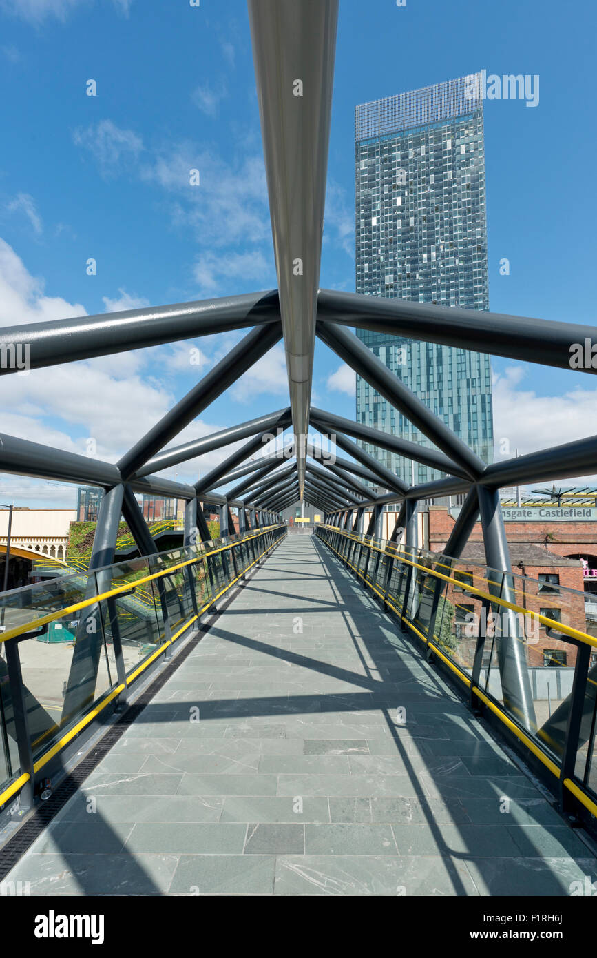 The refurbished Exhibition Footbridge crossing Whitworth Street West near Deansgate in Manchester. Stock Photo