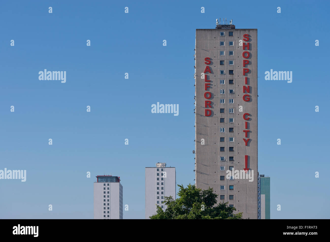 An external shot of the tower blocks at Salford Shopping Centre located in Pendleton, Greater Manchester on a sunny day. Stock Photo