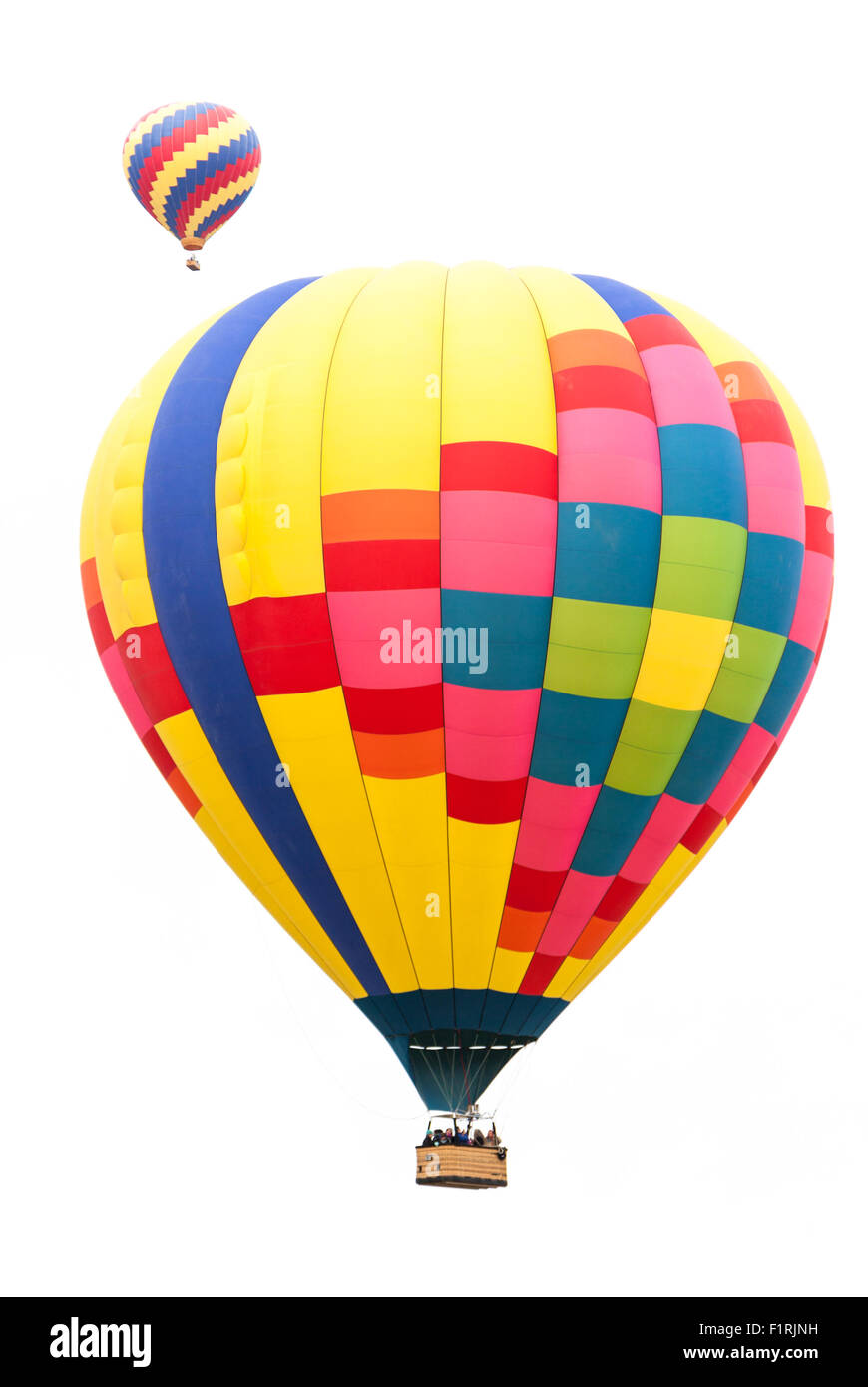 Two colorful hot air balloons isolated on a white background. Stock Photo