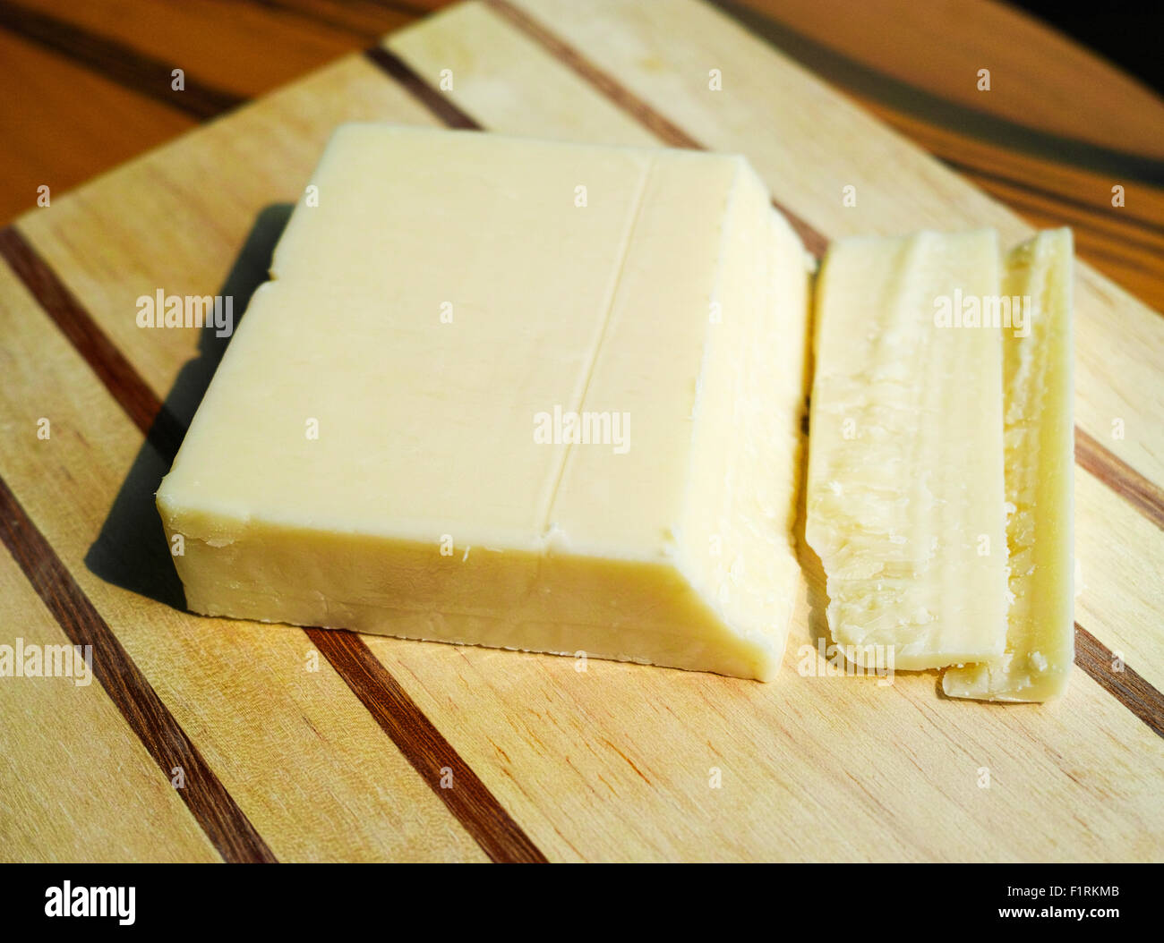 A large block of sliced American cheese Stock Photo Alamy