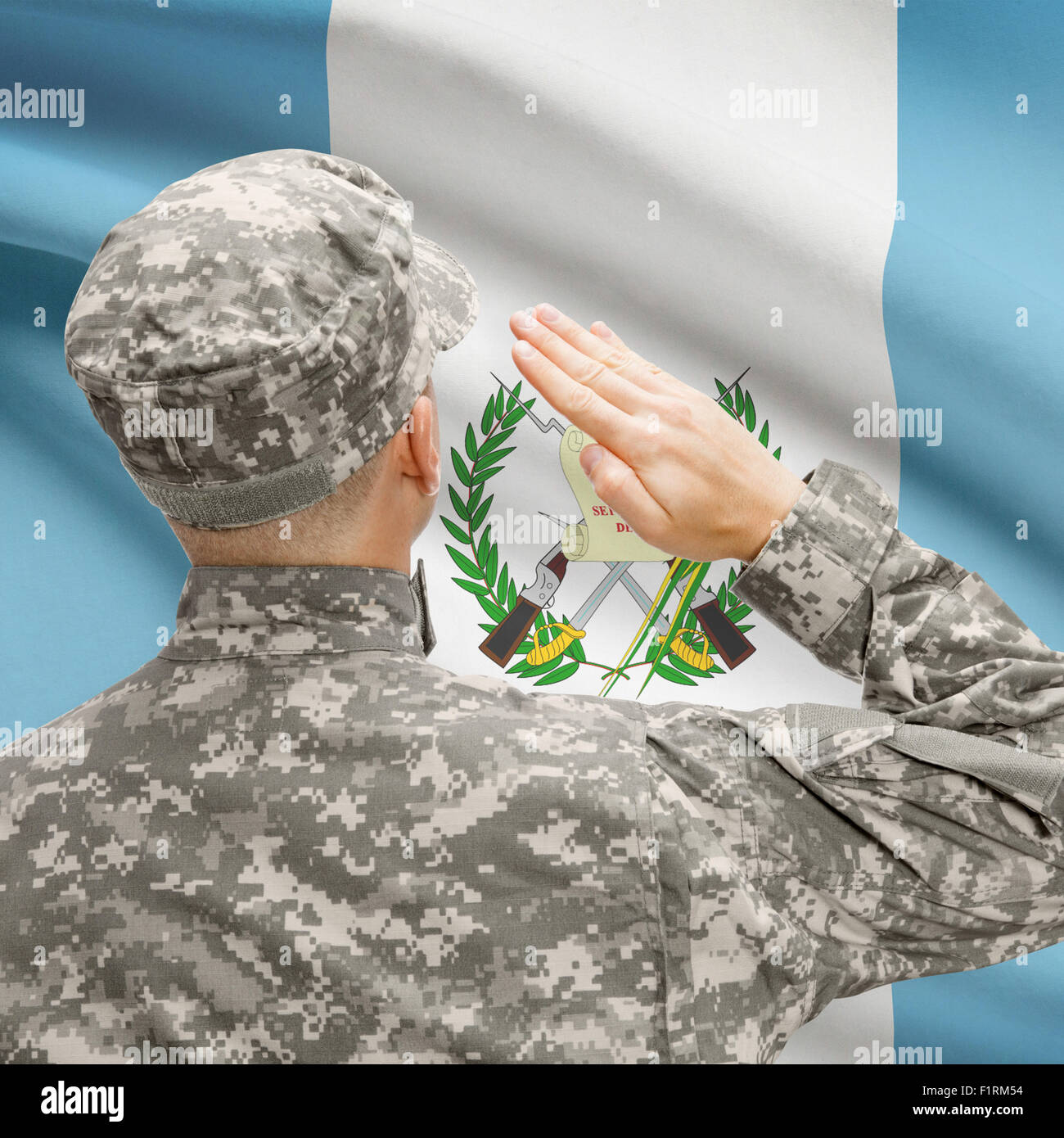 National military forces with flag on background conceptual series - Guatemala Stock Photo