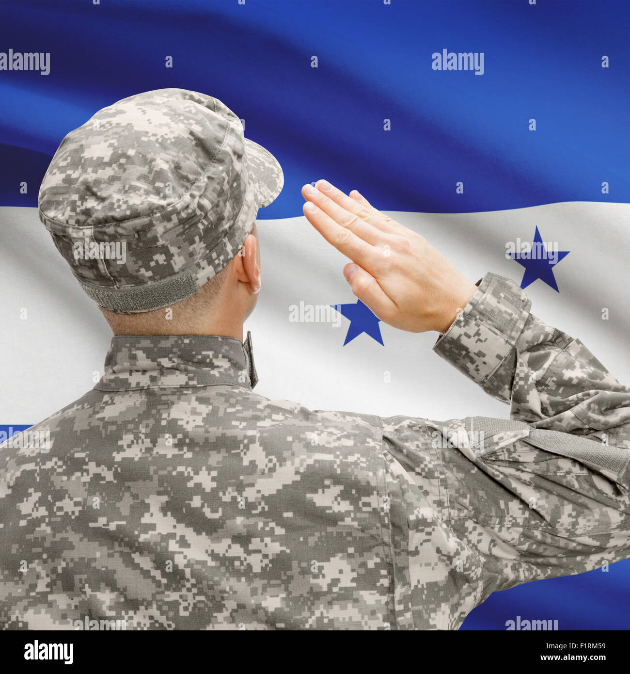 National military forces with flag on background conceptual series - Honduras Stock Photo