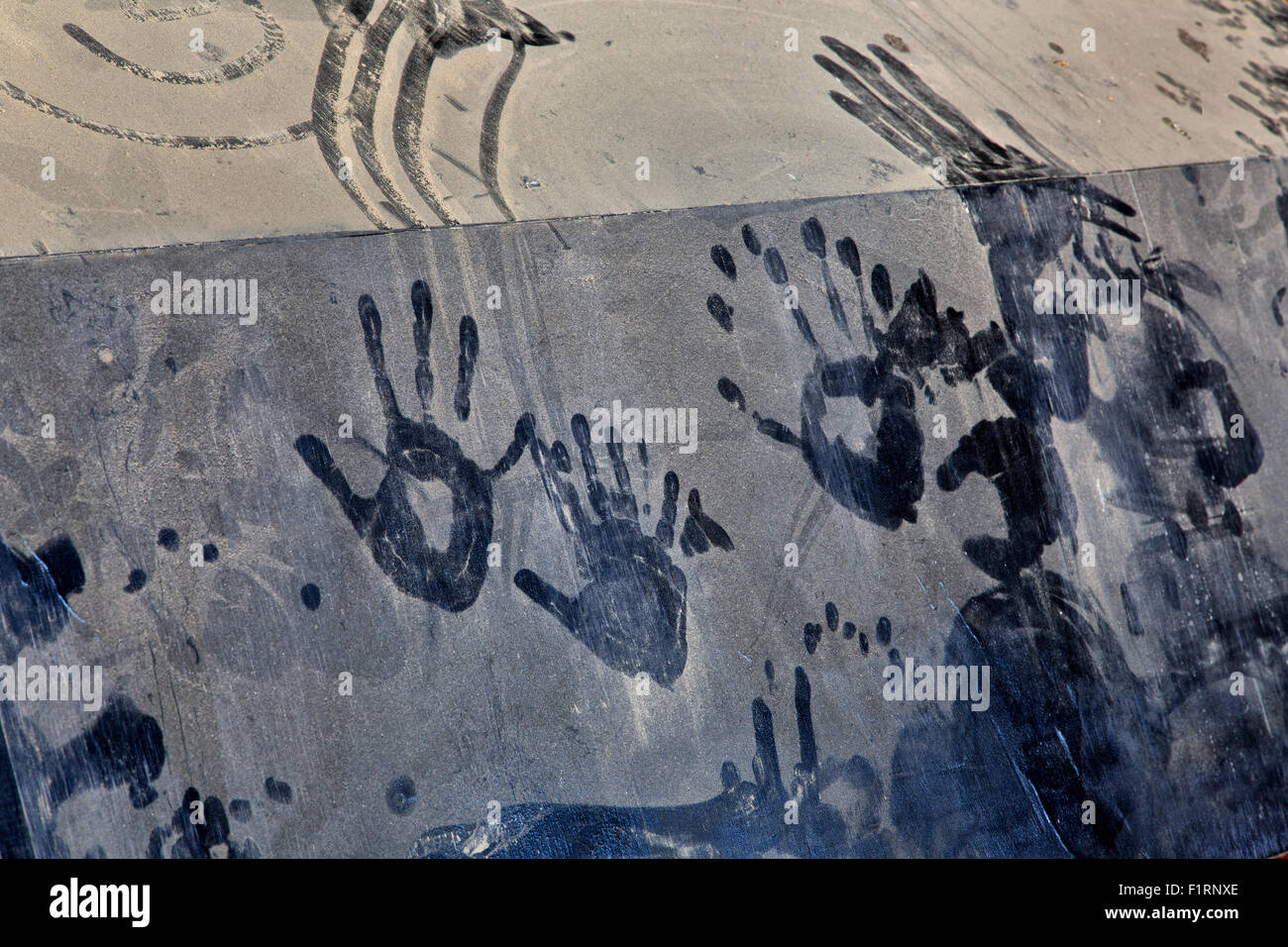 Hand prints & ghostly figure Stock Photo