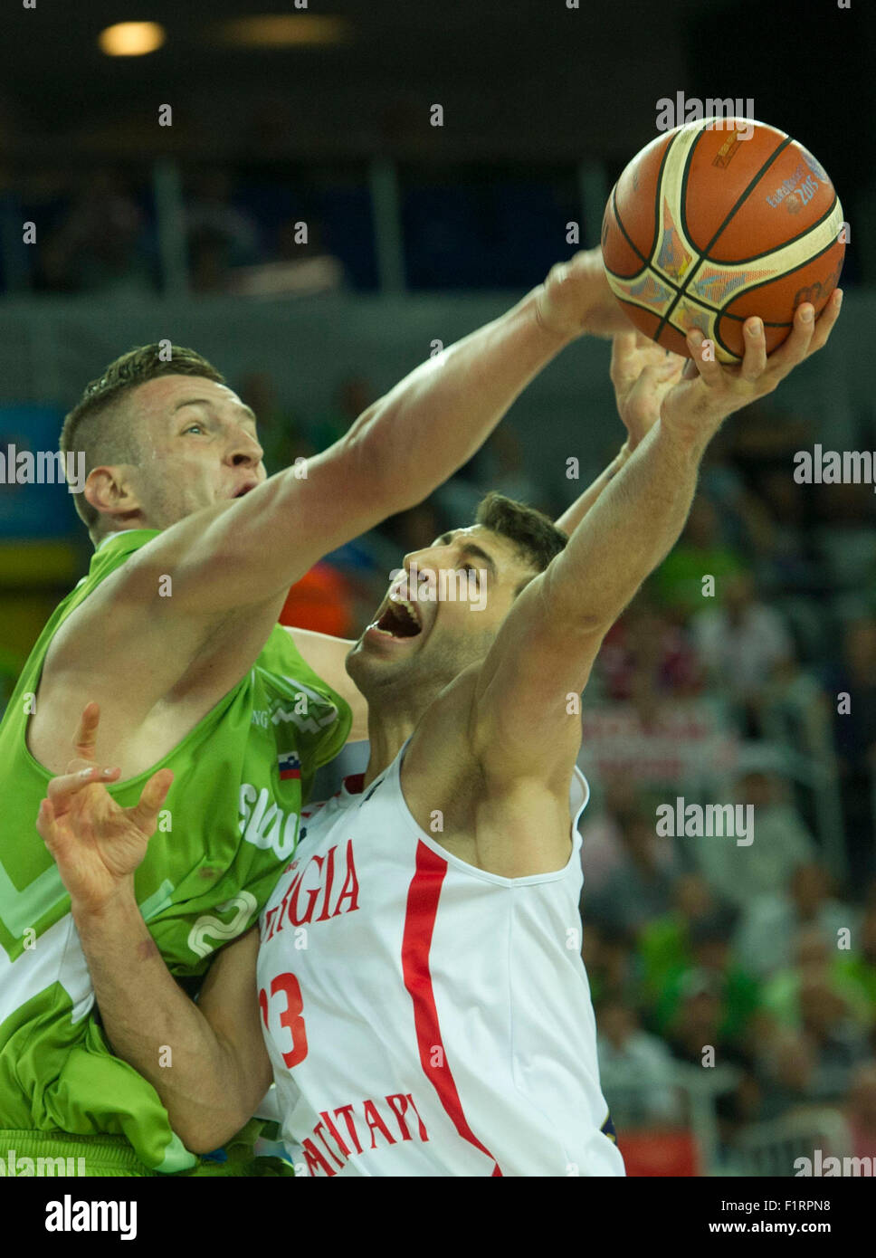Zagreb, Croatia. 6th Sep, 2015. Tornike Shengelia (R) of Georgia vies with Alen Omic of Slovenia during the EuroBasket 2015 Group C match at Arena Zagreb in Zagreb, capital of Croatia, Sept. 6, 2015. Slovenia won 79-68. Credit:  Miso Lisanin/Xinhua/Alamy Live News Stock Photo