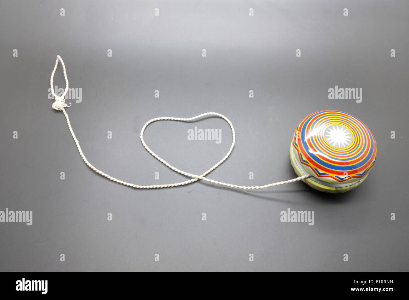Vintage yoyo with twine rolling in heart shape Stock Photo Alamy