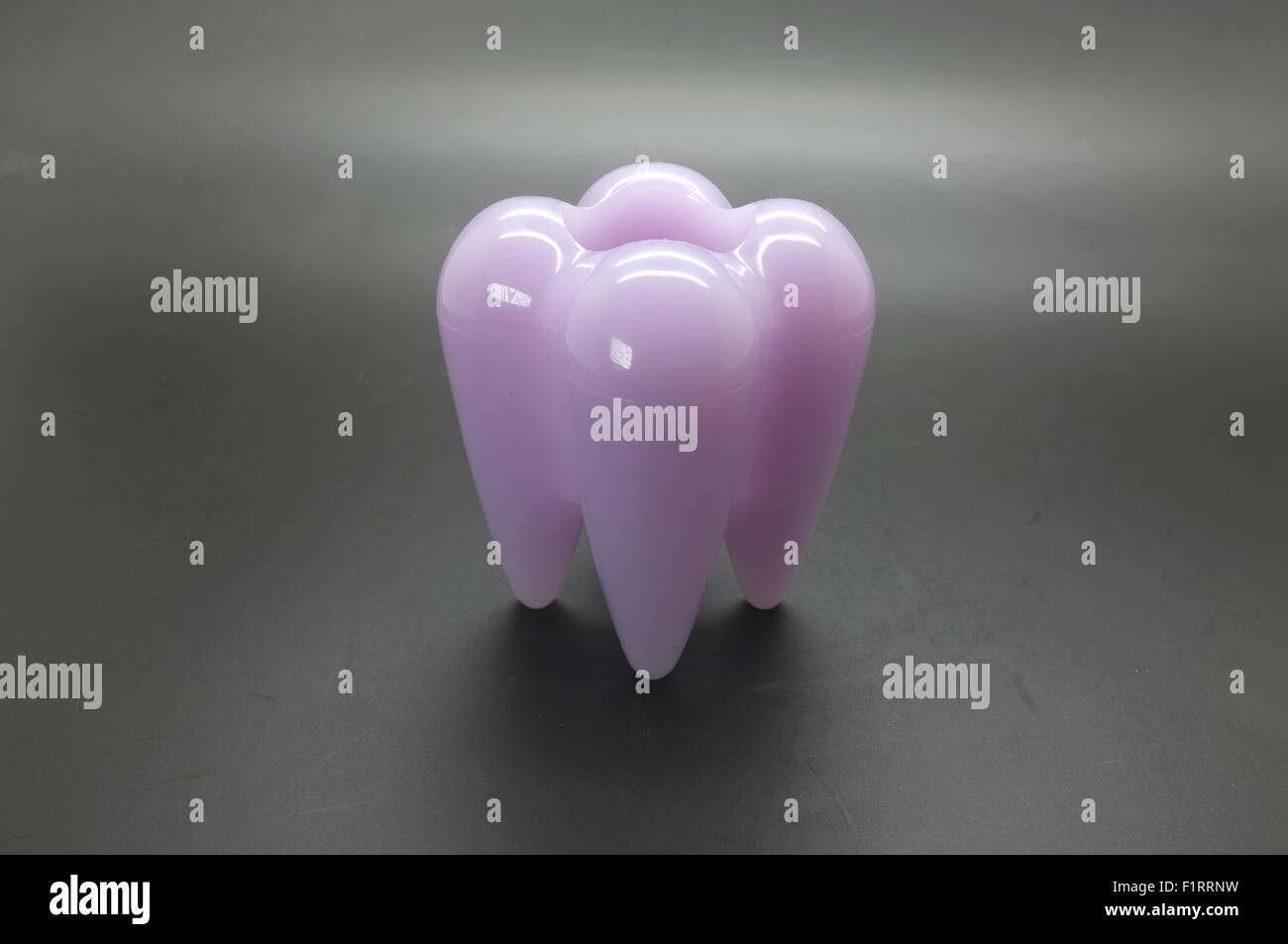 Human tooth model with hole Stock Photo