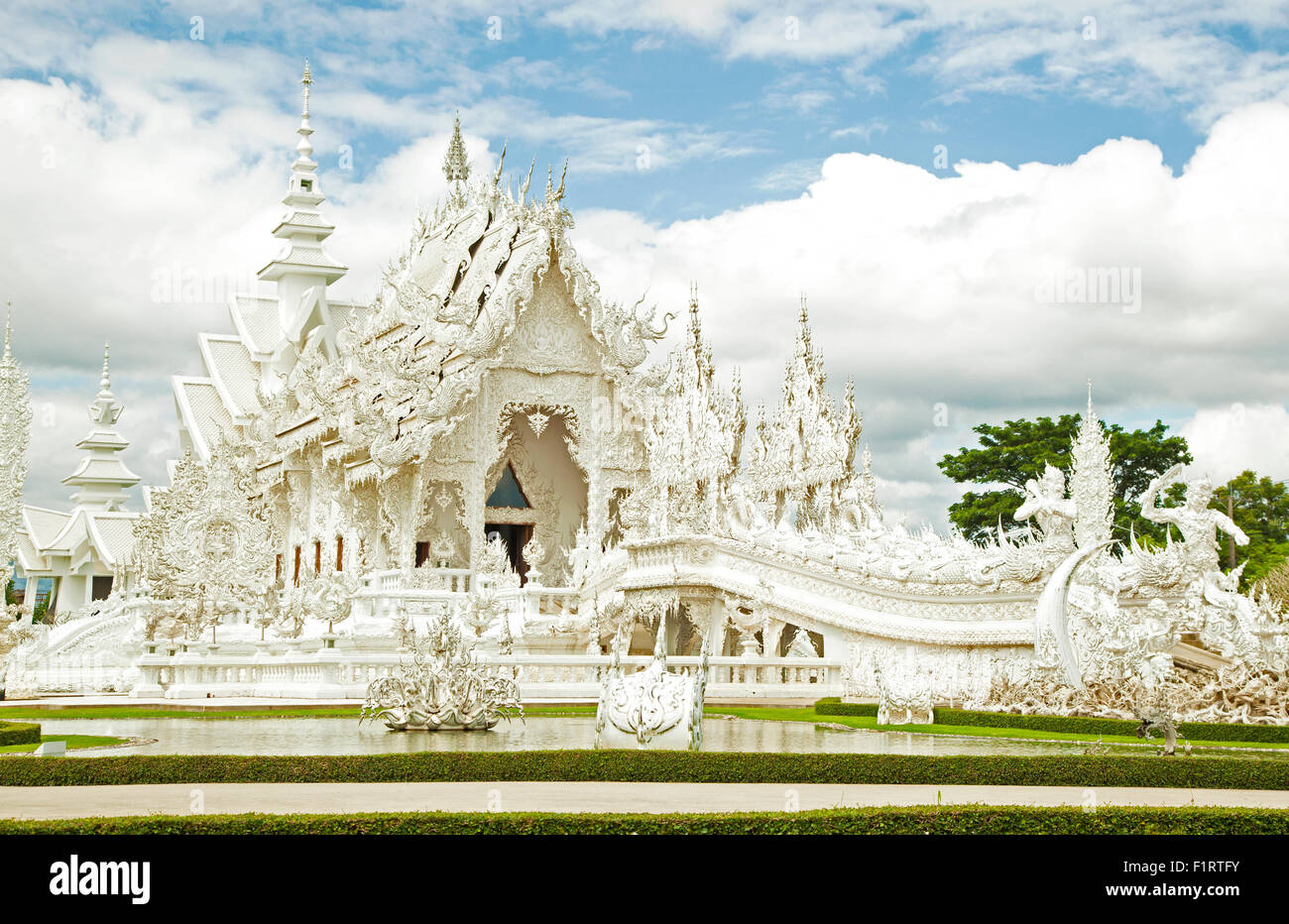 White temple of Buddhism in the north of Thailand Stock Photo