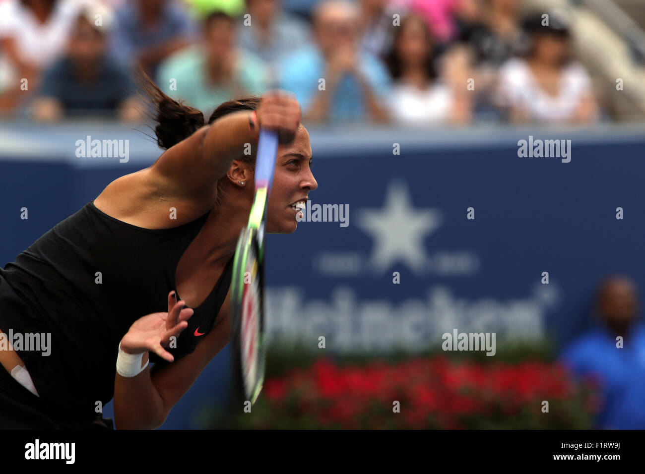 New York, USA. 6th September, 2015. Madison Keys of the United States serving to world number one, Serena Williams during their fourth round match at the U.S. Open in Flushing Meadows, New York on September 6th, 2015.   Williams won the match. Credit:  Adam Stoltman/Alamy Live News Stock Photo