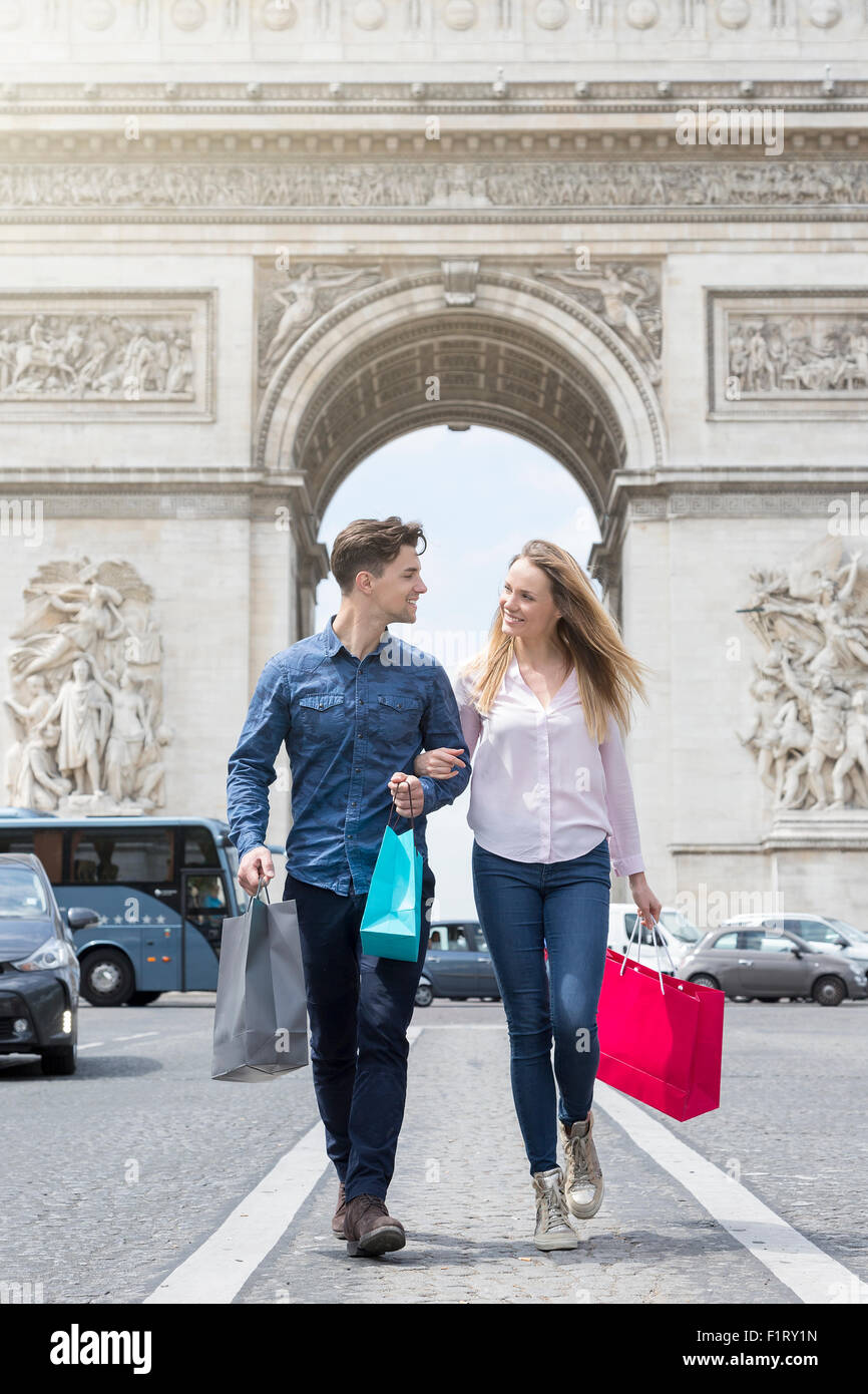 Couple shopping on Avenue des Champs Elysees Stock Photo