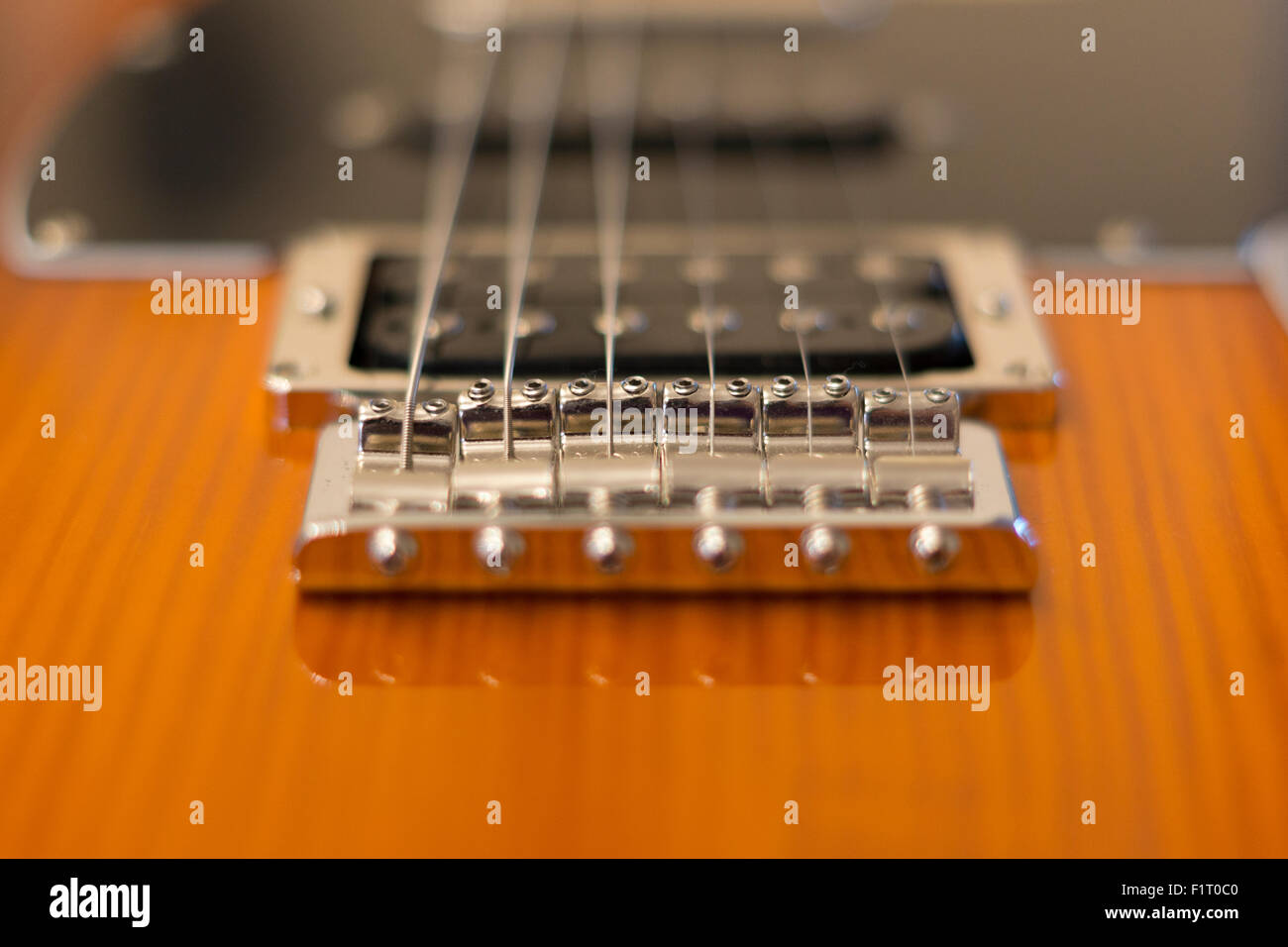 A view on the bridge and saddles of a Fender guitar, Modern Player Telecaster Plus Stock Photo