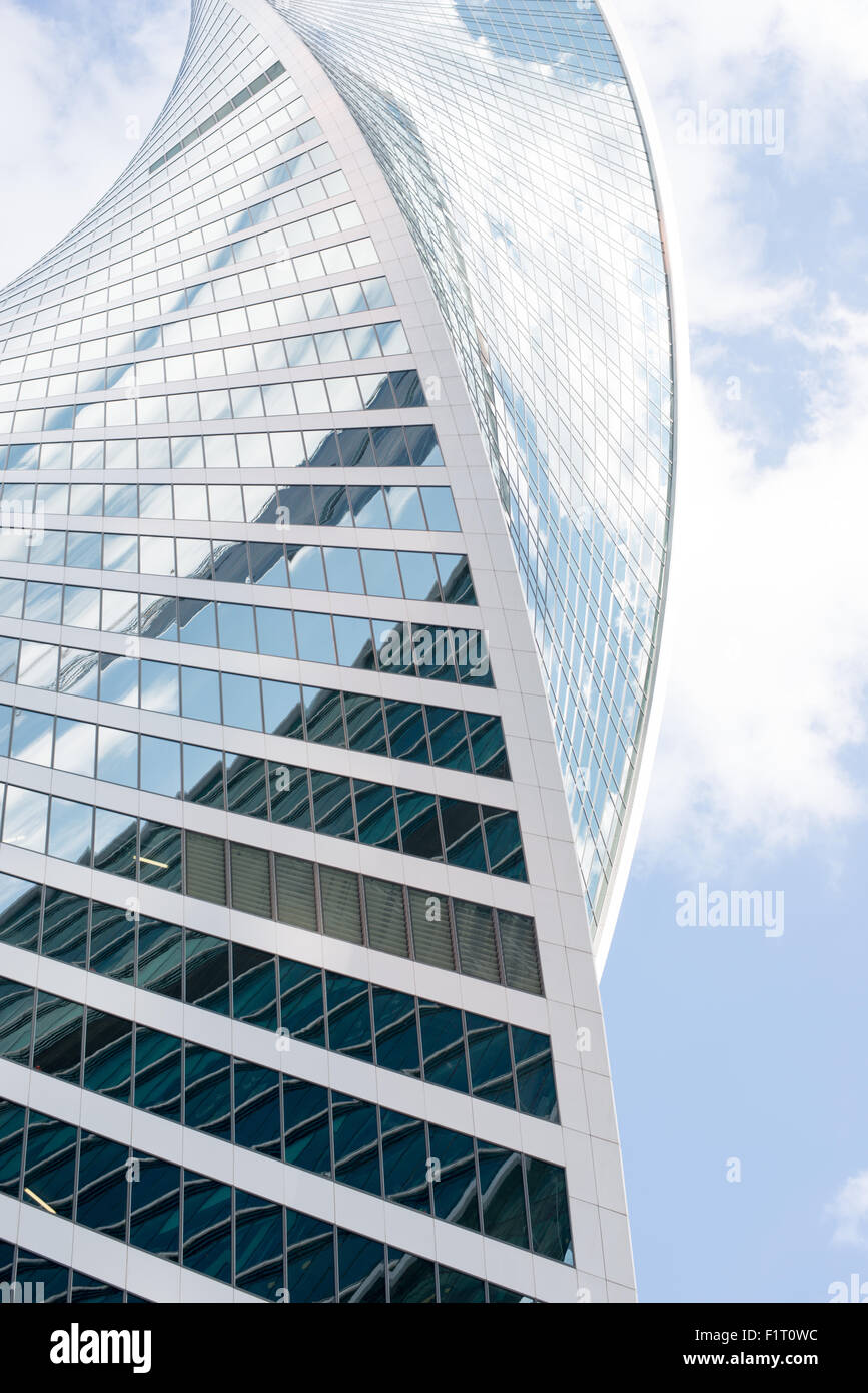 Uncommon high-rise building on blue sky Stock Photo