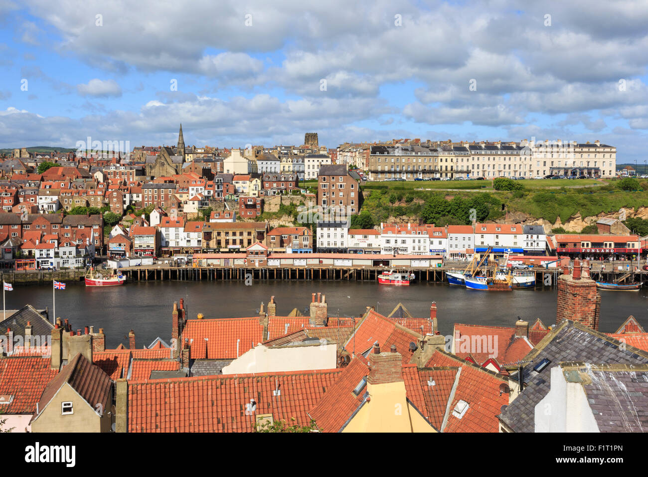 View across rooftops to West Side town, boats, pier, fish market and ...