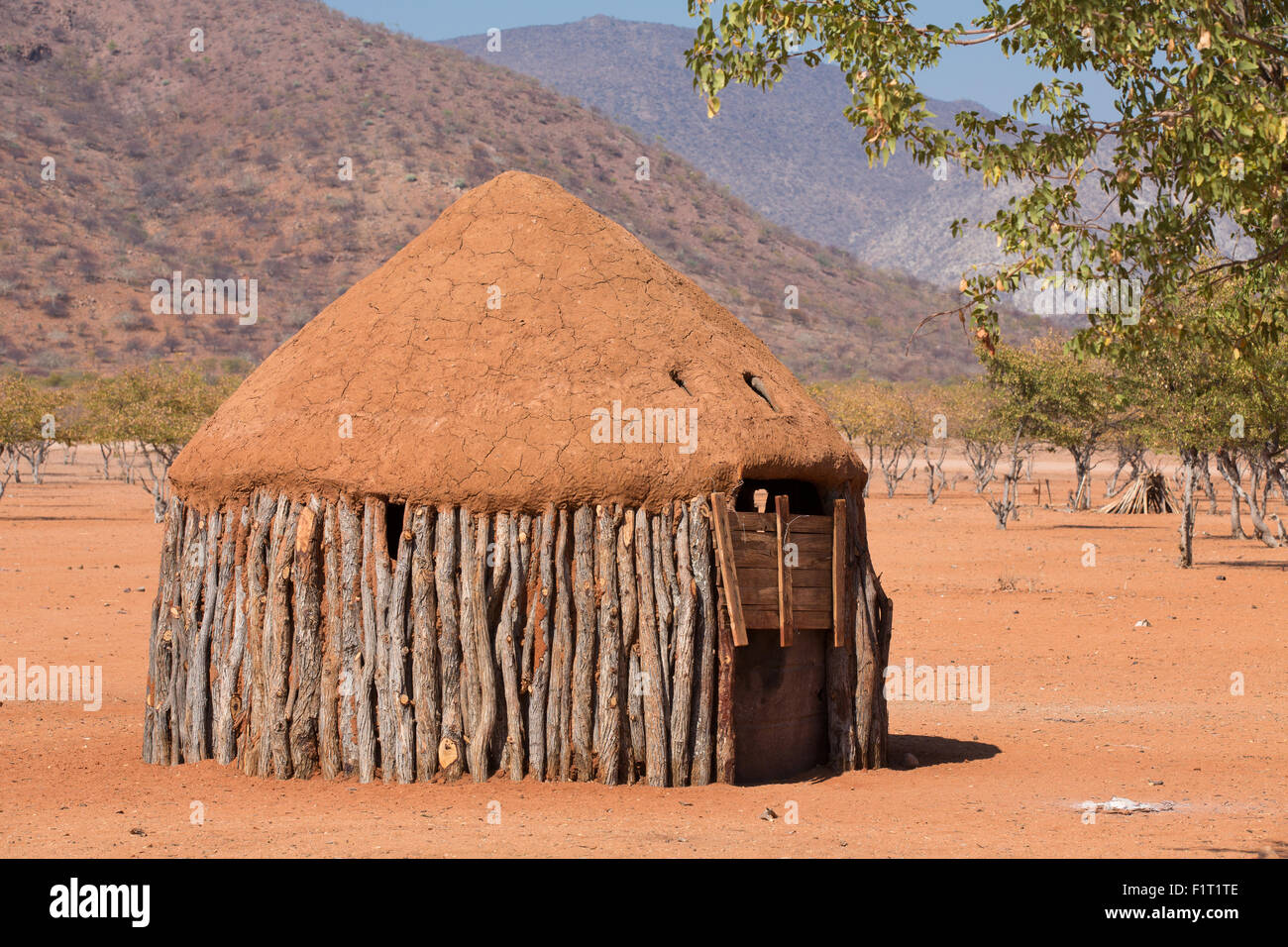 Traditional huts of himba people Stock Photo