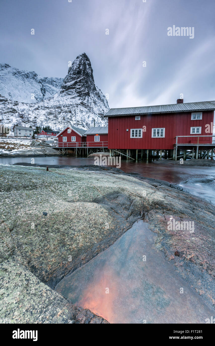 Typical red houses of fishermen called Rorbu, Reine. Lofoten Islands, Northern Norway, Scandinavia, Arctic, Europe Stock Photo